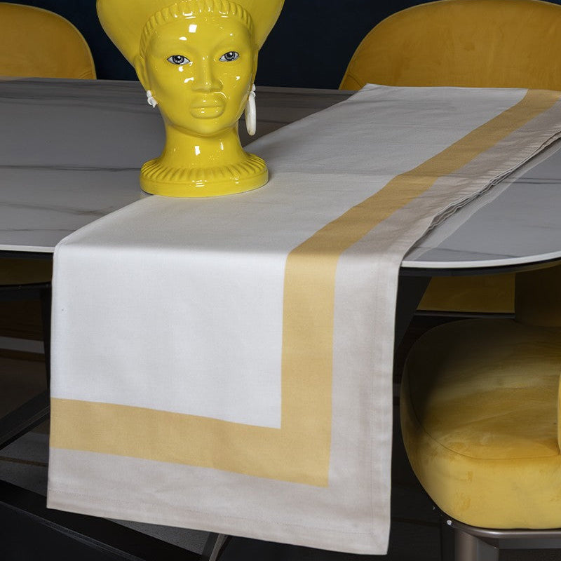 Tovaglia Cristel Neìth in cotone con elegante bordo giallo miele e beige